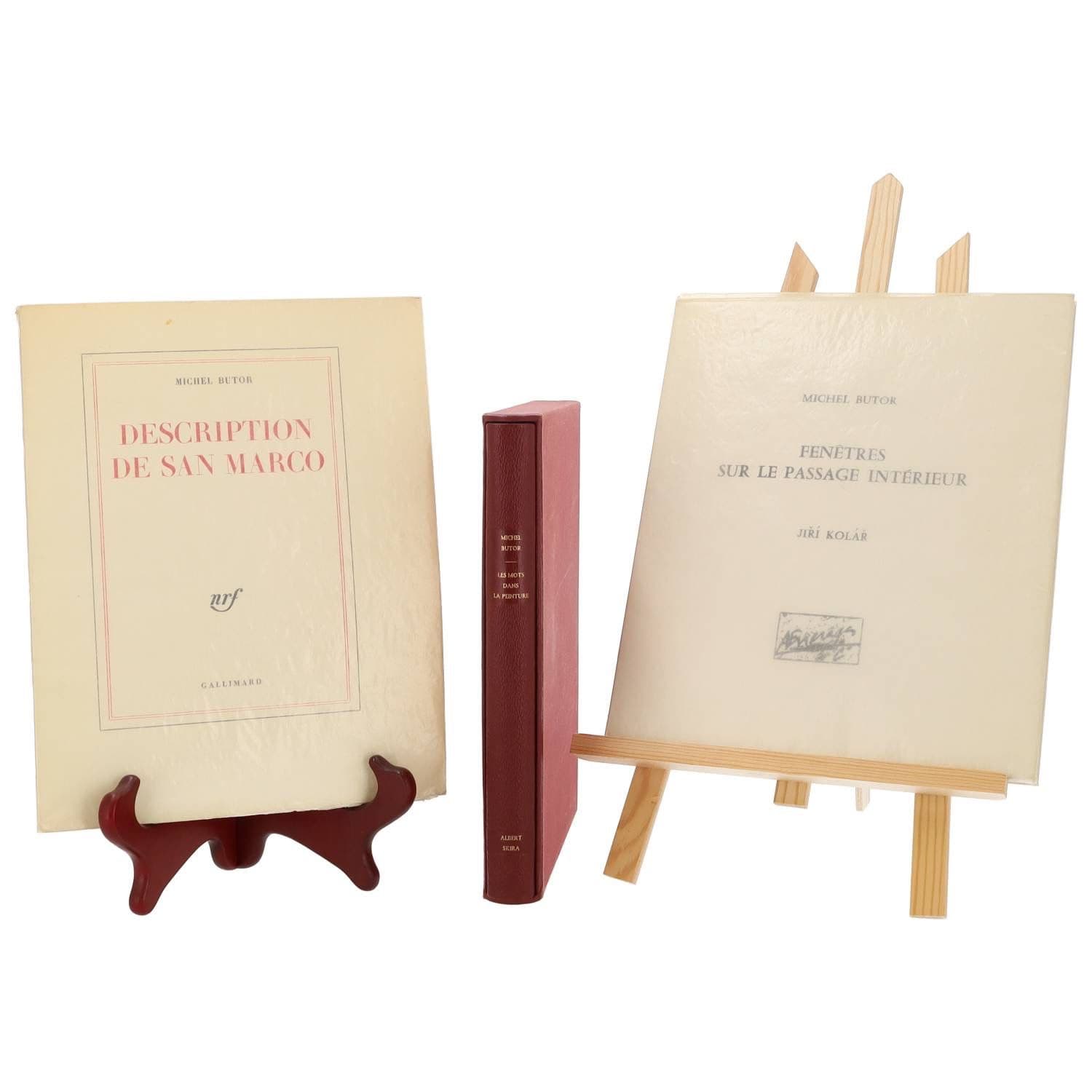 BUTOR Michel
Ensemble de trois ouvrages :
- Description de San Marco. Paris, NRF, 1963. In-4. Édition originale. Un des 65 exemplaires sur vélin pur fil Lafuma Navarre
- Kolar Jiri, Fenêtres sur le passage intérieur. Paris, Encrages & Co, 1962. In-4 Broché. Edition originale, un des 440 exemplaires comportant cinq reproductions.
- Les mots dans la peinture. Albert Skira, 1969, 1 vol. in-8° sous étui.